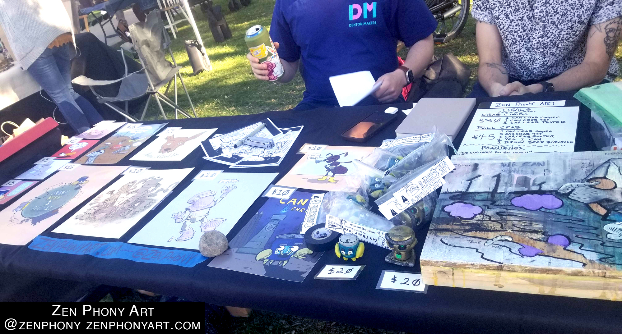 A table with artwork on display.