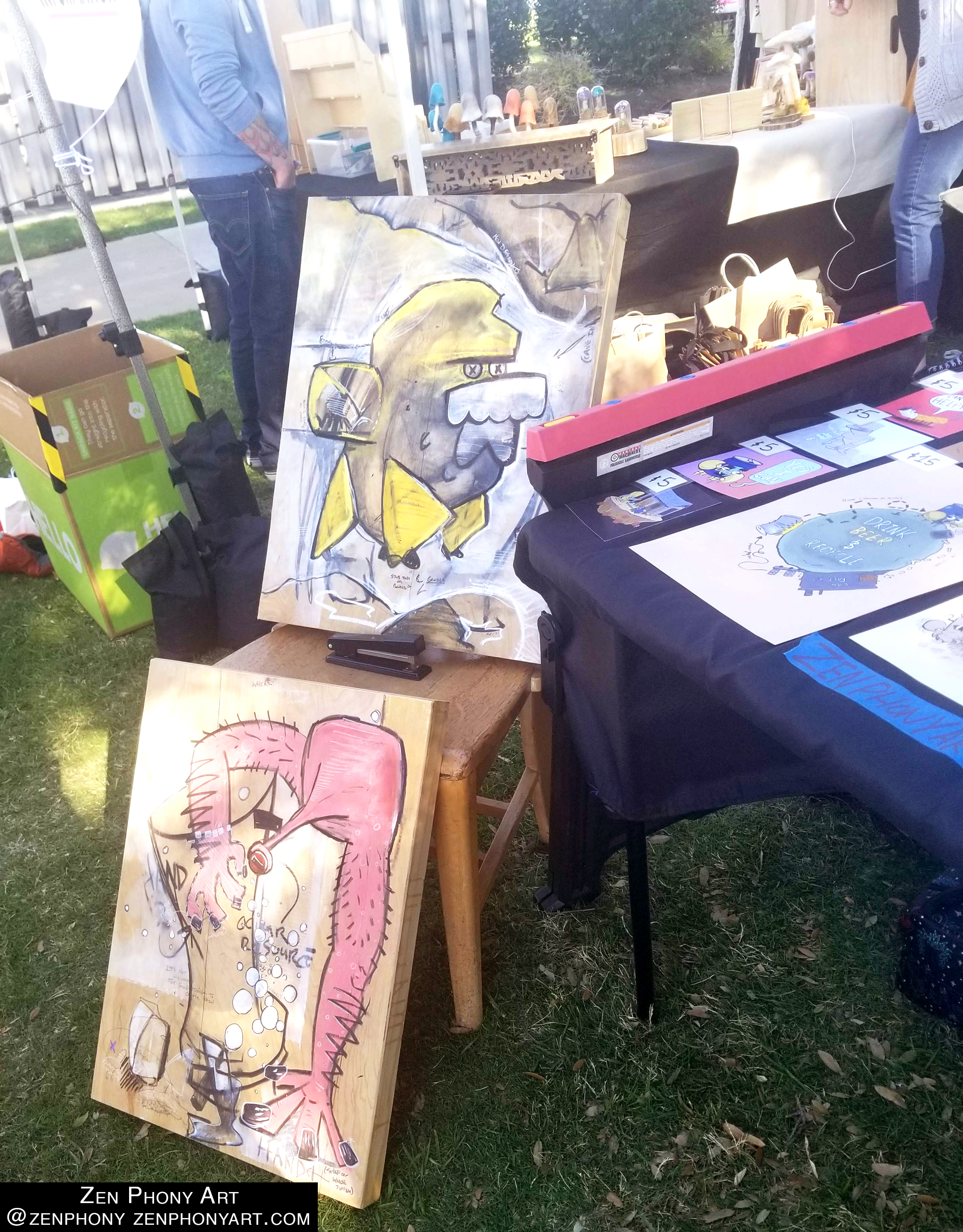 A man with canary yellow skin much like the Simpsons is on the top, cartoonish style, and below is a head with no eyes and two arms holding it up on a canvas. 