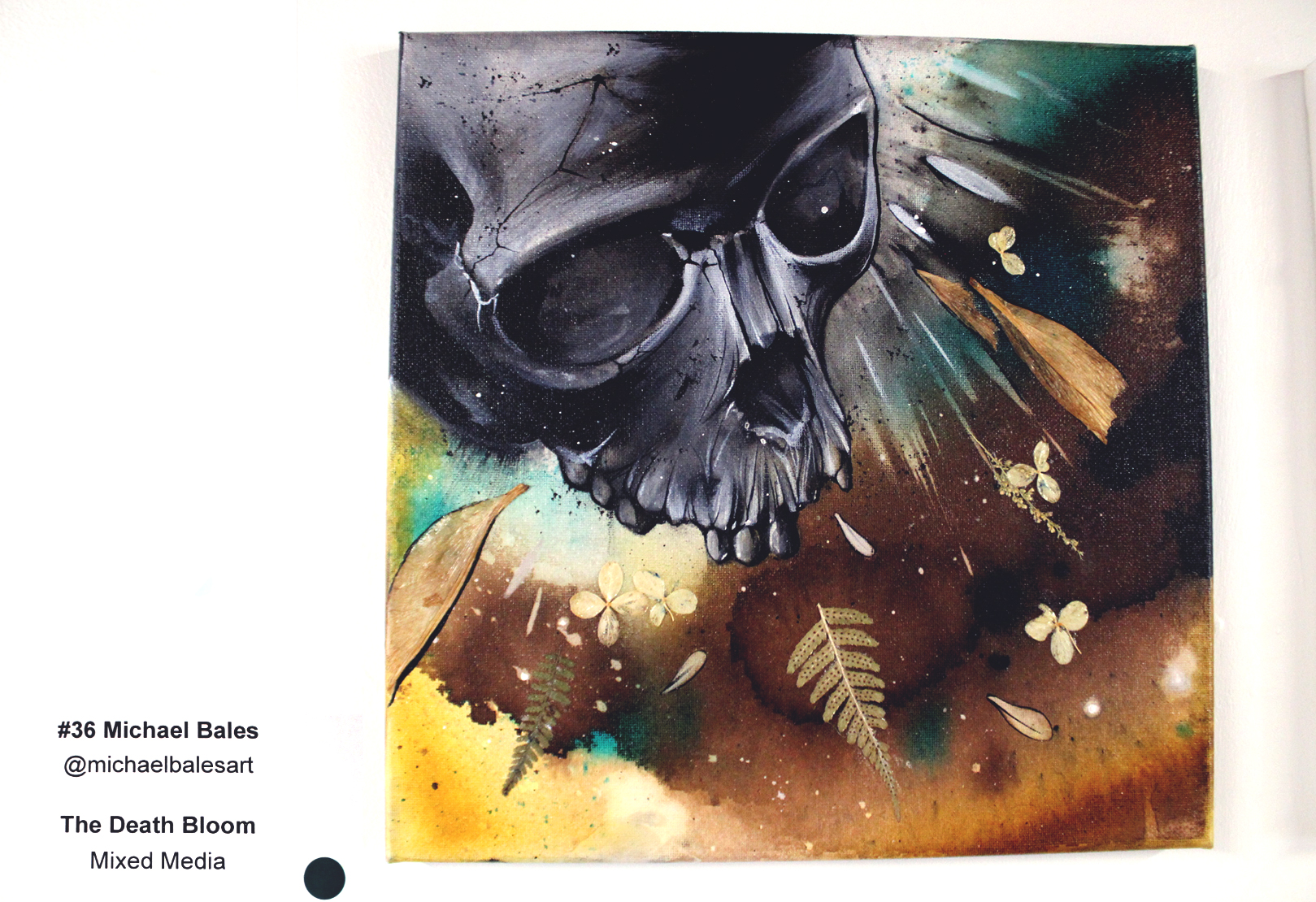 A painting of a grayscale skull upon a forest background with fern leaves impressioned into the painting of browns and golds. 

#36 Michael Bales @michaelbalesart 
The Death Bloom
Mixed Media

